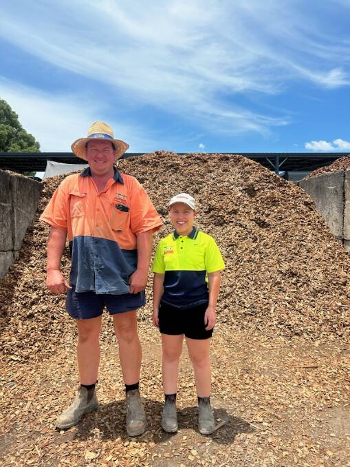 Murwillumbah Landscape Supplies manager Alan 'AJ' Loe and machinery operator Jessica Sanderson at the business which like all similar operations in the 5 km surrounding the fire ant discovoery is subject to a NSW DPI biosecurity order. Picture: Supplied.