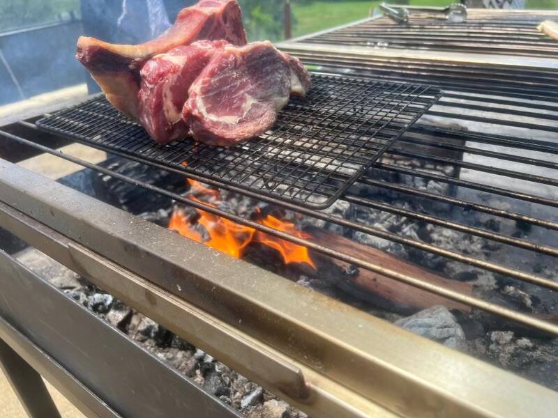 Locally sourced beef, pork and lamb are prepared on parrilla-style grills with charcoal from locally sourced timber. Picture: Carin Garland