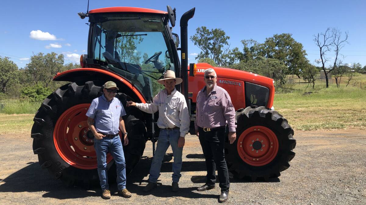 SUCESSFUL BID: Milne Bros service manager Peter Comino, Rolleston grower James Bishop and Kubtoa Australia zone manager Jon Neville in front of James' new M126GX Kubota tractor. 