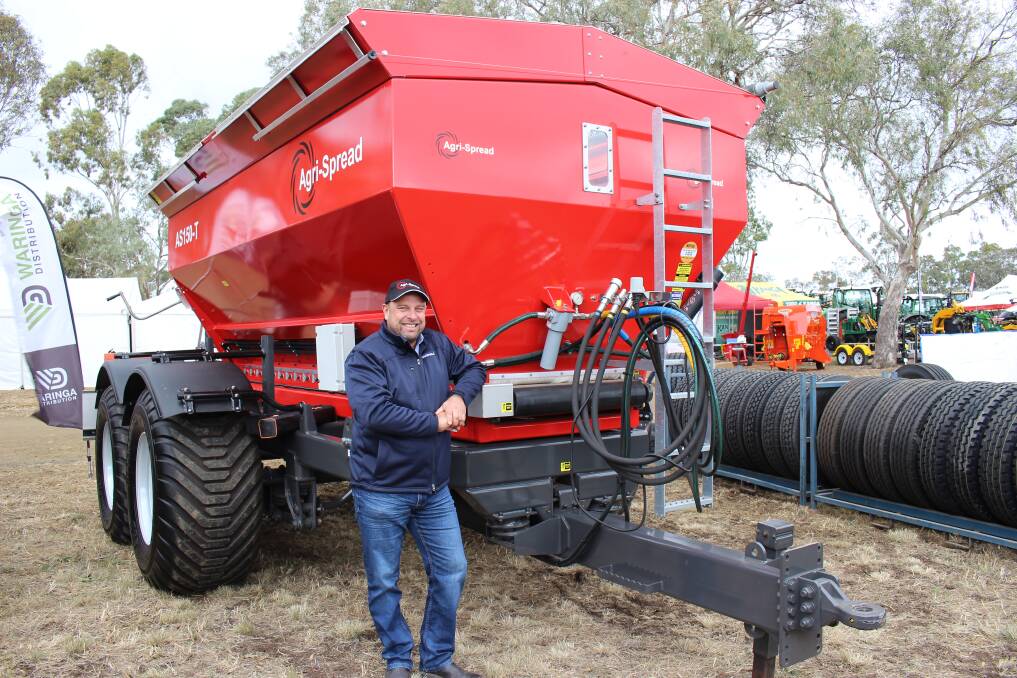 Irish spreader: Waringa dealer service and customer support manager Josh Heal at the CRT FarmFest field days with the AgriSpread spreader. 
