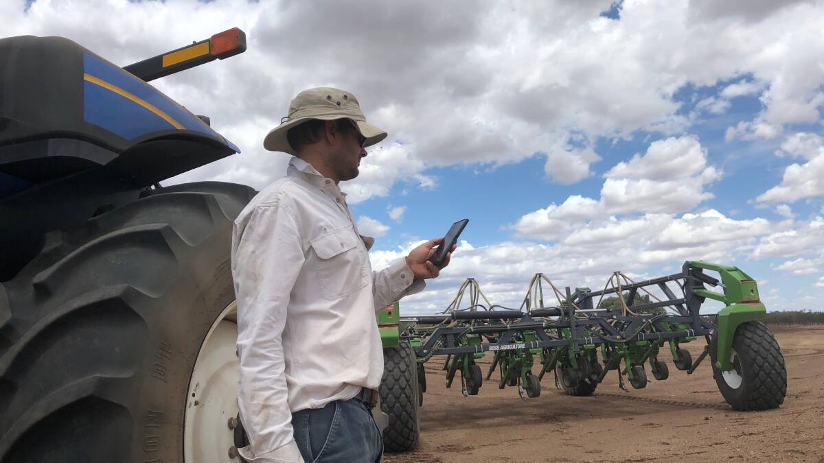 NO SERVICE: Farmer Tony Single tries unsucessfully to connect to internet to check the weather in a paddock on his property 'Narratigah', which is situated between Coonamble and Coonabarabran NSW. 