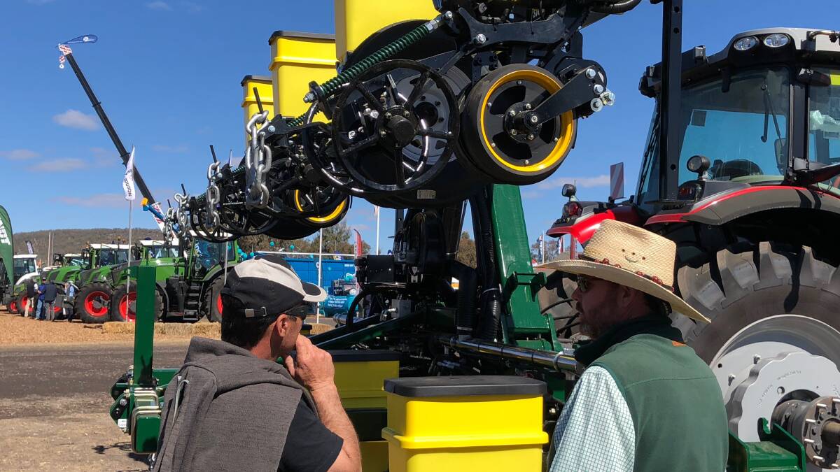 TIME IN THE SUN: The custom excel stack-fold planter bar attached to a SP200 precision row-unit for summer crop planting garnered a lot of attention at Commonwealth Bank AgQuip.
