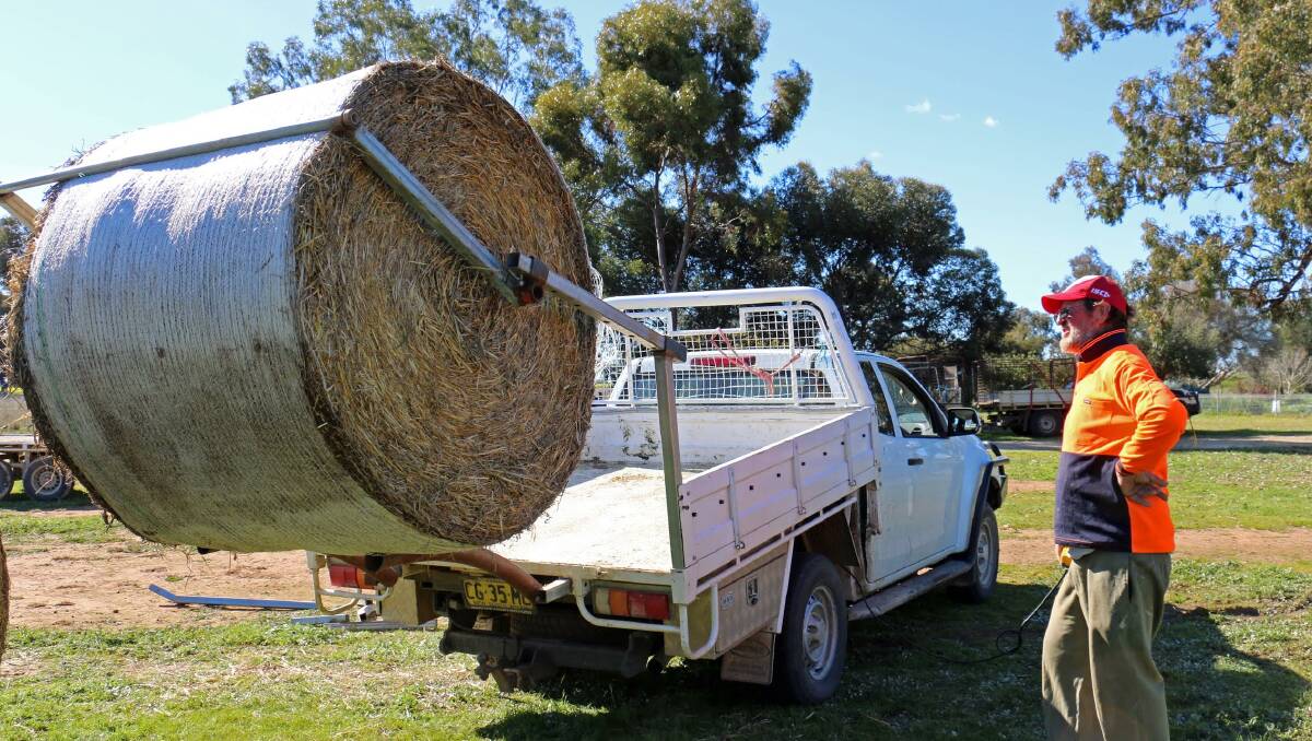 Henty Agri-innovator Award nominee Peter Mills and his ute bale lifter.