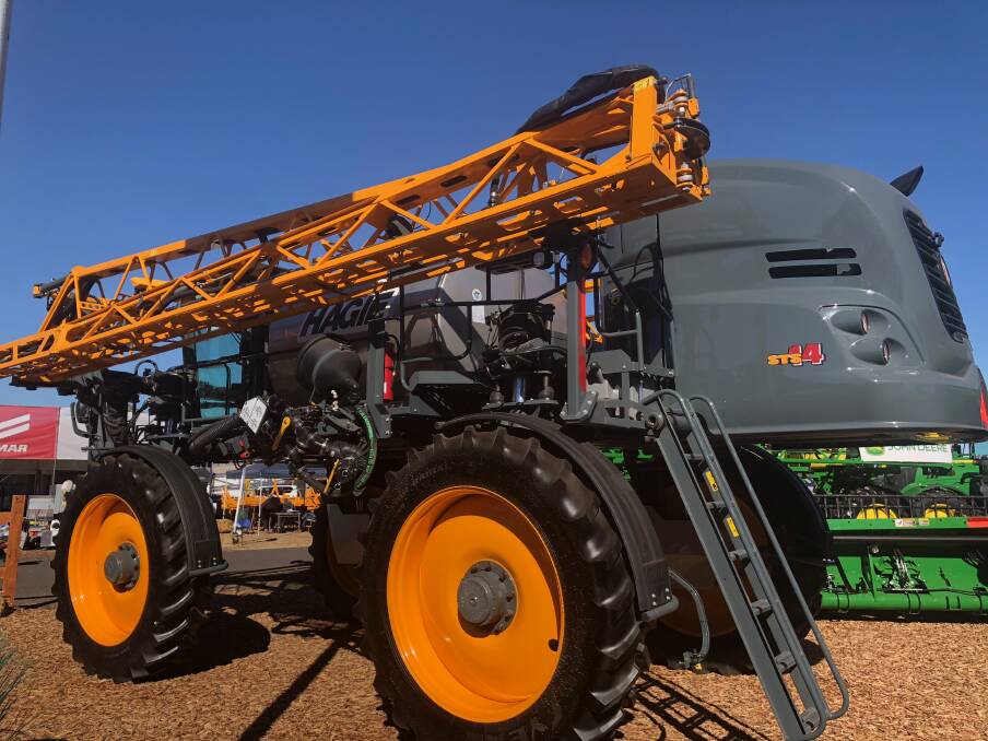 DEERE IN DIGUISE : Visitors to the Peel Valley Machinery site at Commonwealth Bank AgQuip, were able to see the newly imported Hagie STS14 high-clearance self-propelled sprayer.
