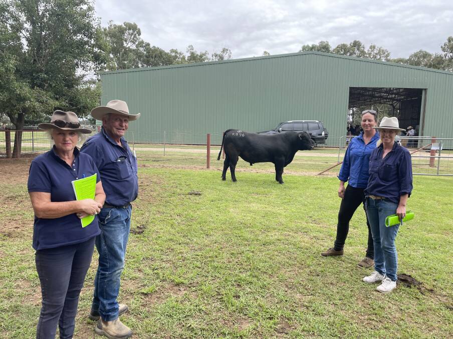 Cass and Charles Kimpton, Toora West, Victoria and Ingrid Clarke, Coolac and Christie Freeman, Mt Eliza, with the $45,000 bull Rennylea 0896.