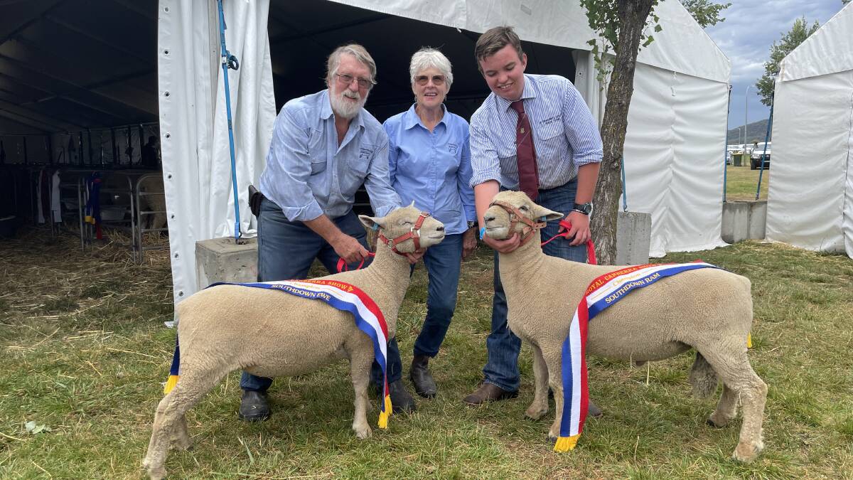 Ross and Jeanette Wilson, Cotties Run Southdown stud, Bathurst and Bill Corkhill, Boorowa, holding the champion ram and ewe bred in the Cotties Run stud.