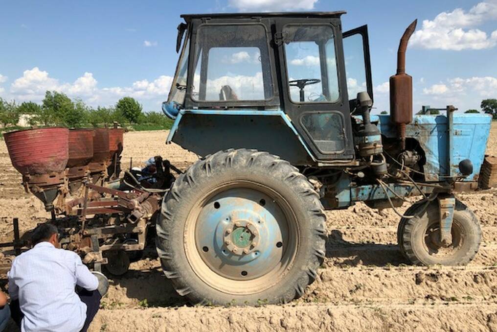 Old school: This basic cotton planter and ageing tractor were typical of machinery used on massive irrigated farms in Uzbekistan before Indorama Agro began its big-spending upgrade a few years ago.