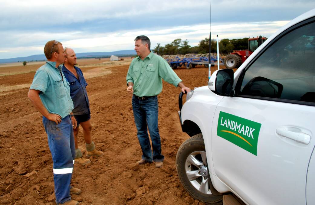 Landmark’s managing director, Rob Clayton, pictured (right) in his previous role as South East Australia regional director, with NSW customers Kim and Phil Swain, Buddaview Partnership, Peak Hill.
