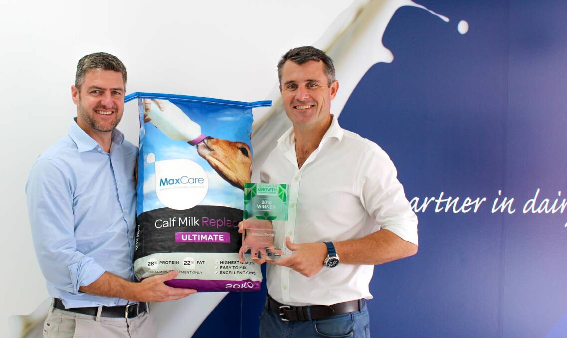 Maxum Foods directors Ben Woodhouse and David Russell, with a sample of the company's MaxCare livestock nutrition product.