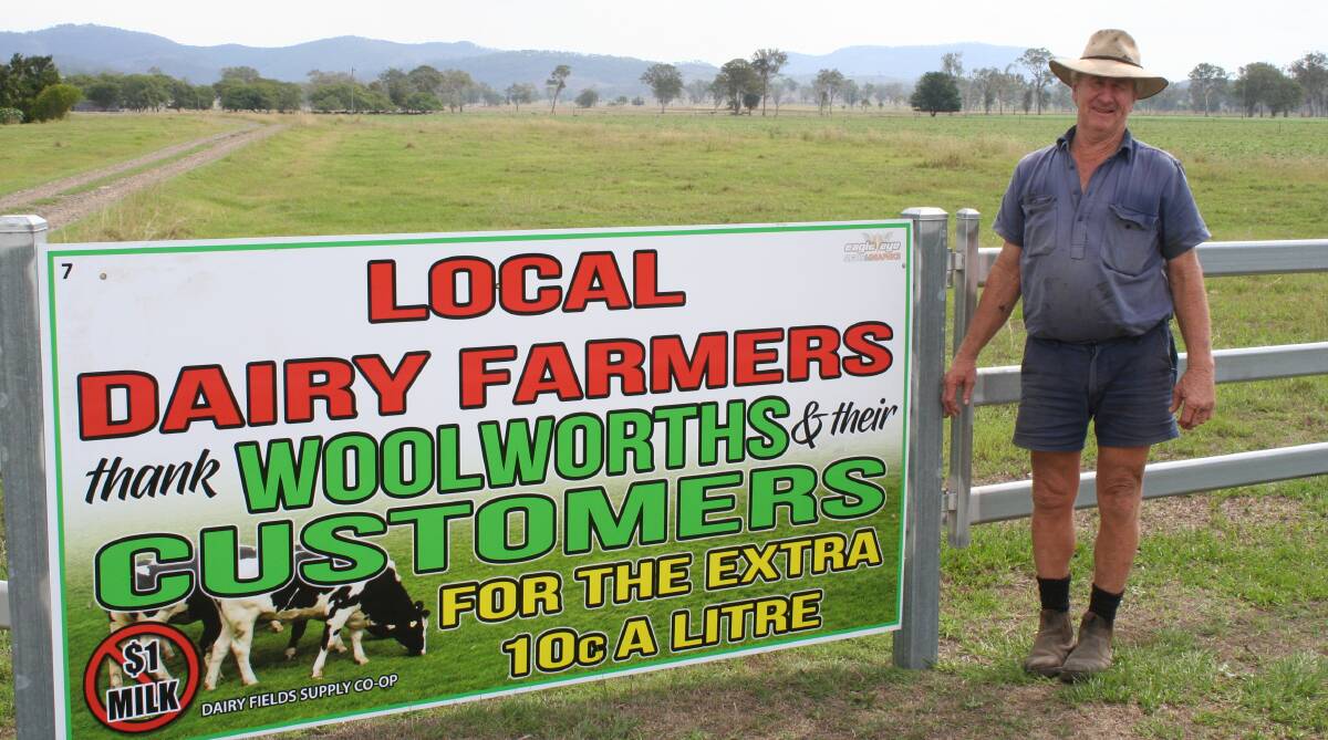 APPRECIATIVE: Scenic Rim dairy farmer Mark Platell has fixed a sign thanking Woolworths' consumers to the front gate of his Bromelton property. He welcomed the decision by ALDI and Coles to follow Woolworths in scrapping $1 per litre milk.