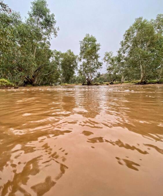 The normally dust dry Todd River in central Australia is in flood.