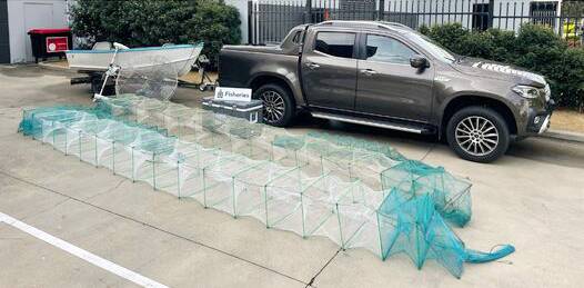 FISHY BUSINESS: Fisheries officers seized the Mercedes dual-cab ute along with the long net after the raids. Pictures: Victorian Fisheries Authority. 