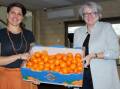 Elizabeth Brennan (left) and Sue Middleton promoting Moora Citrus and Northern Valley Packers. Picture from Farm Weekly.