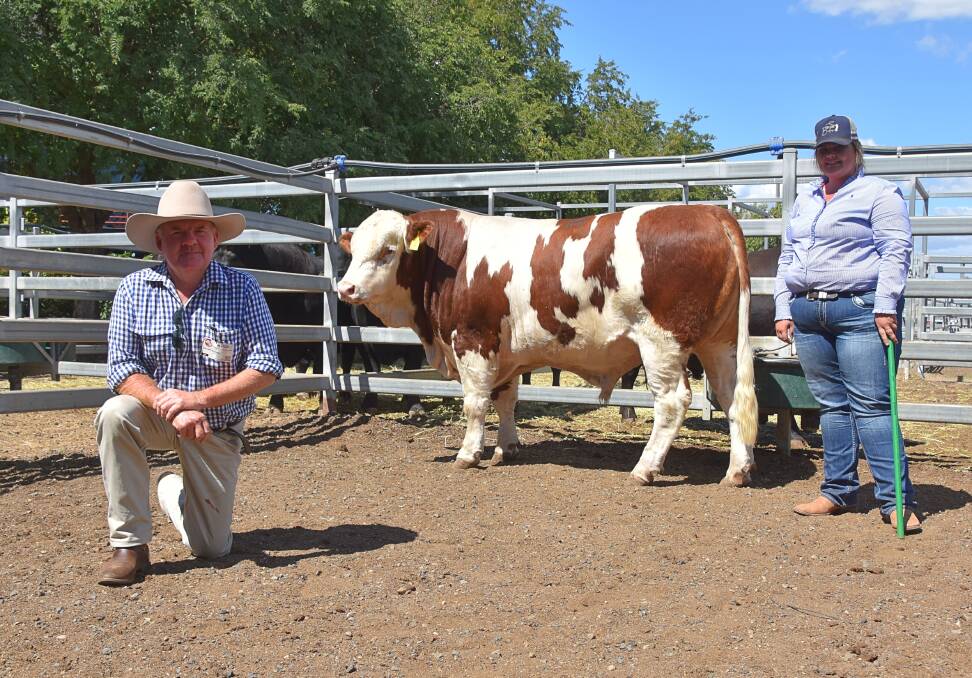 Buyer Donald Burnett, Mount Douglas Pastoral Company, Clermont, with new purchase Kipper Springs Ping who sold for $20,000, and vendor Sophie Laycock, Kipper Springs, Clermont. 