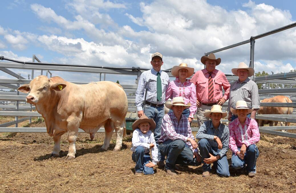 Wattlebray Rippa, who sold for $40,000, pIctured with vendors Trevor and Lolita Ford and their children Daniel, Samuel, Liam and Chloe, selling agent Randall Spann, Elders Studstock, Moura, and buyer Chas Nobbs, Cordelia, Moura. Picture by Sheree Kershaw. 