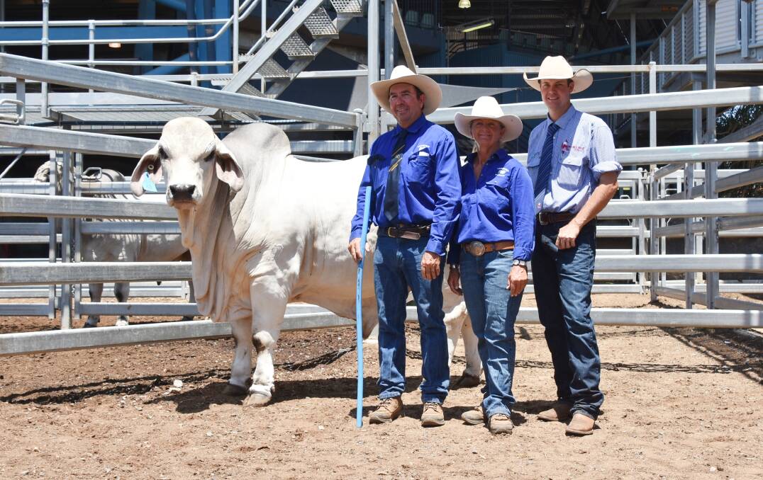 Matthew and Janelle McCamley with agent Brad Passfield and top priced bull Lancefield M Eclipse 5905/M.
