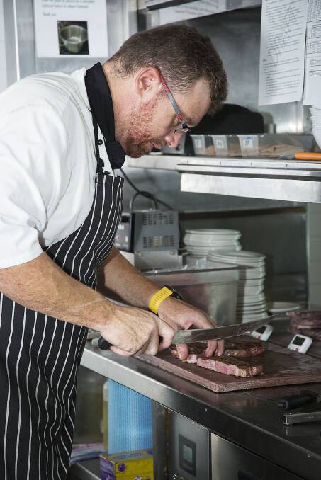 Executive chef John Alexander preparing the Wagyu branded beef entries.