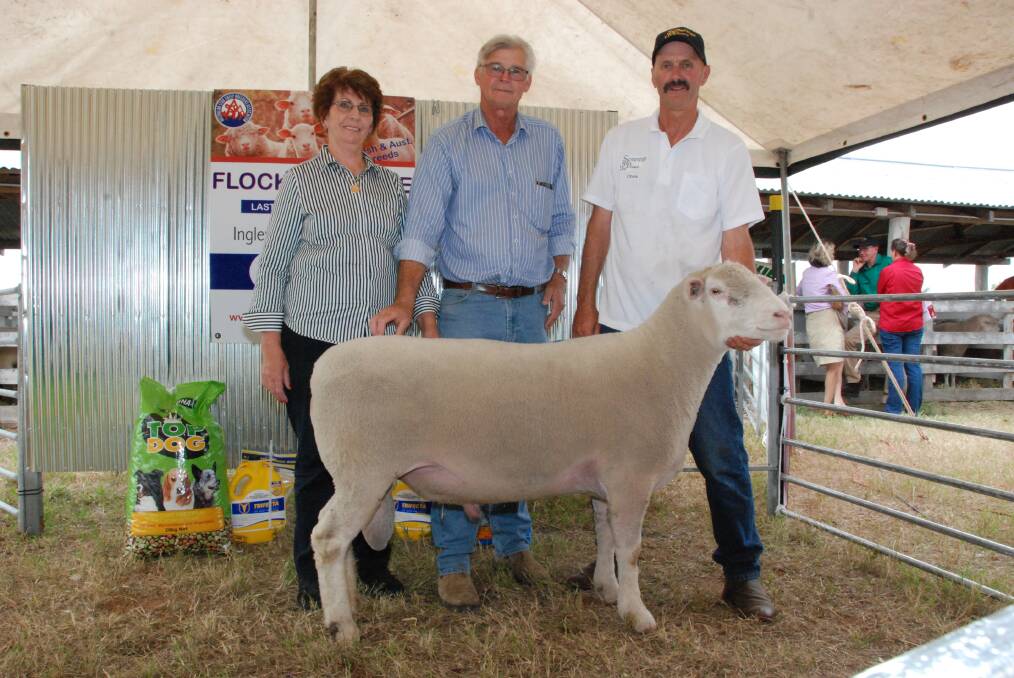 The $2000 top priced ram at Inglewood's 2018 Elite Flock Ram Sale. The Poll Dorset ram was bought by Ross Ellis (centre) for the Cooper family, Hendon and pictured with vendors Meryl and Chris Rubie, Sovereign Poll Dorsets Stud, Warwick.  