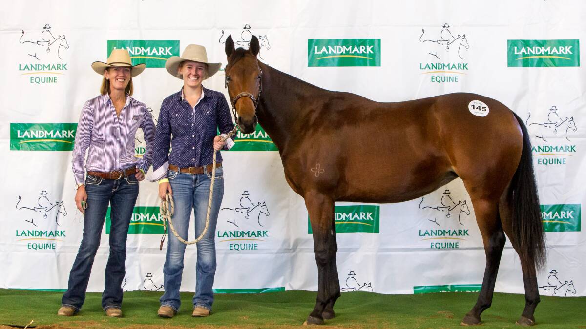 Lot 145 “Freckles Confidante” with Kirsty and Georgie Whatmore, Whatmore Farming Trust, Tamworth, NSW. Top priced yearling at $21,000 was purchased by L  and T Challacombe, Capella. Photos supplied by Wild Fillies Photography.

