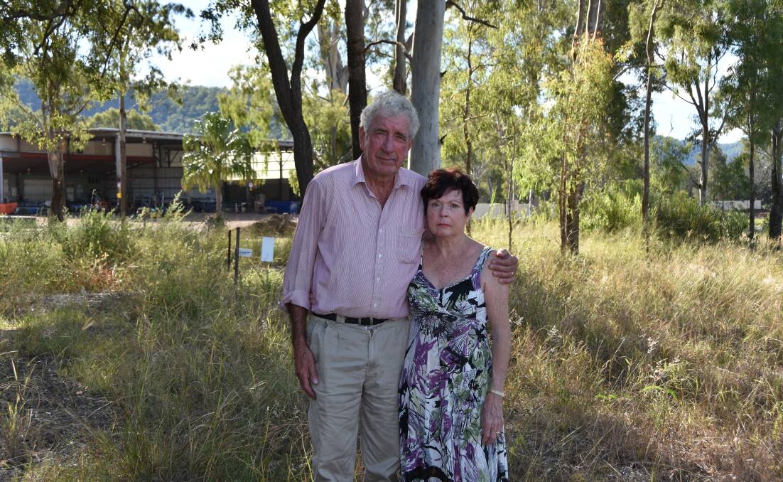 Bill Pukallus and Anna Hobbs-Pukallus in their paddock on their property called Currawan Park, Widgee near Gympie. The property is across the road from a steel fabrication site. 