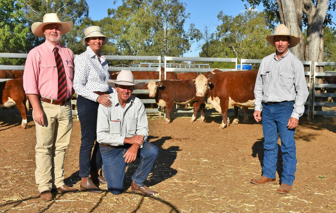 Elders Andrew Meara, Wararba Park's Keith and Chris Dobson with top price $16,000 cow and calf of the sale, Wararba Park Satin Lady H155, and buyer Wesley Lowien, WRL Herefords, Kaimkillenbun.