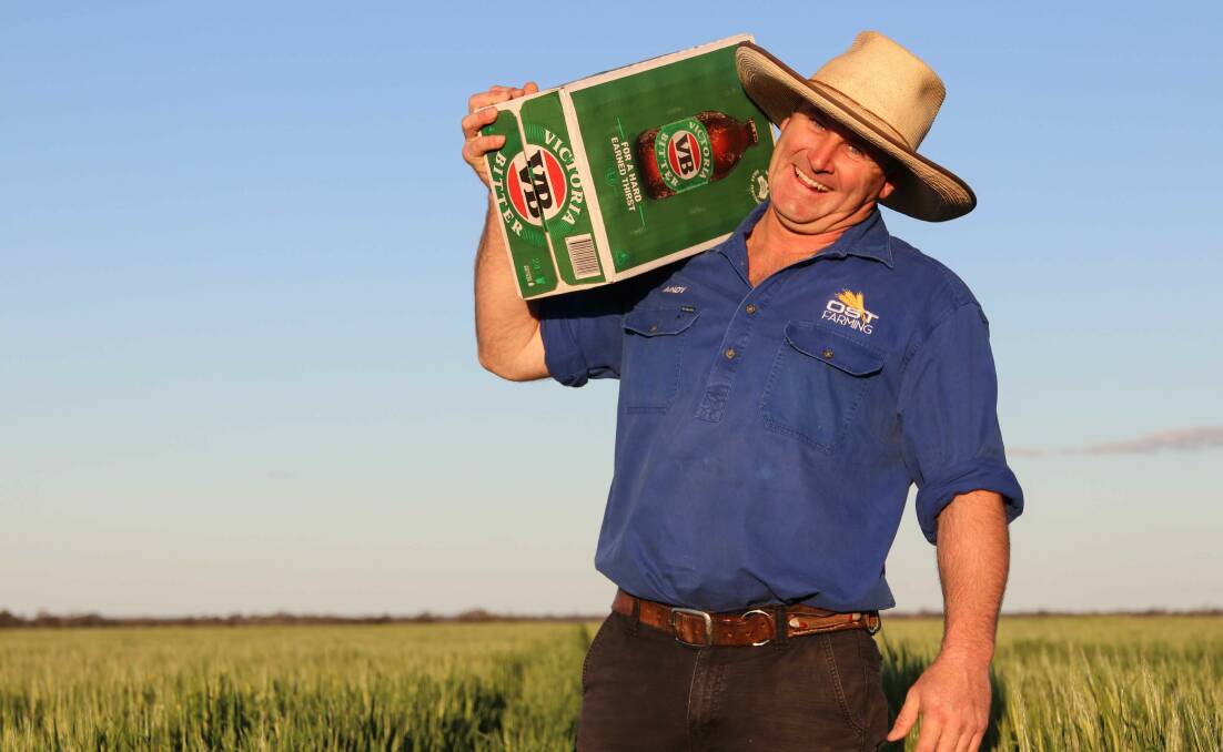 North Star farmer Andrew Ostwald with a box of VB, a product that will be made using barley direct from his property.