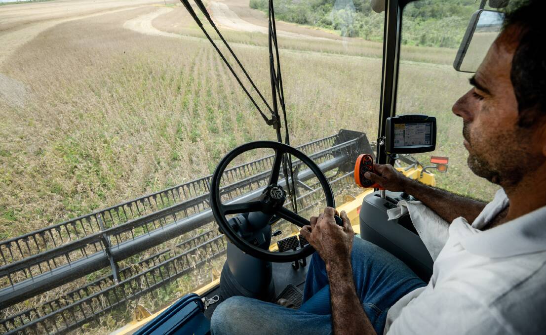 A Brazilian header driver harvests soybeans near Itapetininga. Brazil is set to be the major producer of soybeans this year but a shock ban on glyphosate use has thrown its agriculture sector into disarray. Photographer: Paulo Fridman/Bloomberg via Getty Images.

