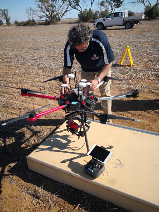  Dr Ramesh Raja Segaran from APPF partner URAF (the Unmanned Research Aircraft Facility) at the University of Adelaide helps set up hyperspectral camera equipment for in-field work.