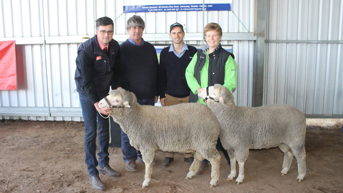 Roly Coutts, Elders agent representing Glenora Pastoral, Richard Hobbs, Sunnyside Partnership, together with his agent Jacob Davies, Rodwells Horsham and Koonik stud principal Fiona Cameron with the two top price rams, which both fetched $4250. 