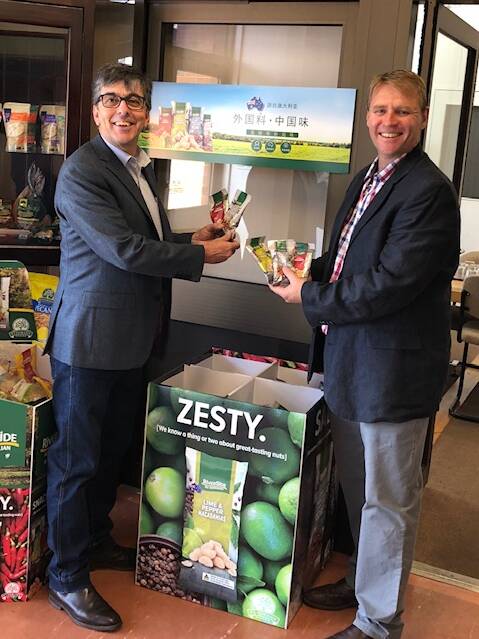 Stahmann Farms' Andrew Waddell with business CEO Ross Burling. 