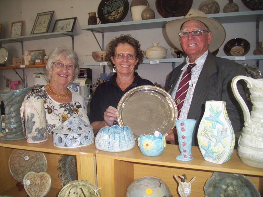 Winners: Yeppoon and District Show Society president Ken Landsberg awarded best exhibit of the 2017 show to Gloria Martin and Sue Vickermann of Beachpotters.