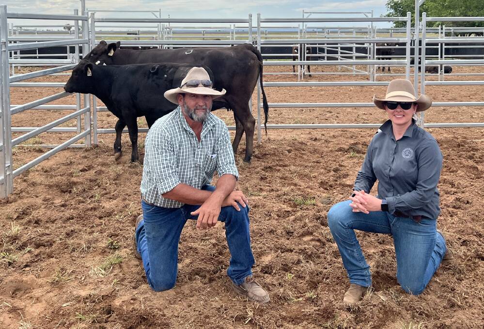 Wayne Cant with Bar H Grazing product manager Ria Garside, at the 2022 Bar H Grazing Wagyu spring female sale with the $32,000 top priced PTIC cow and calf package BARFM1882. Picture by Anthony Ball, Elders Stud Stock. 