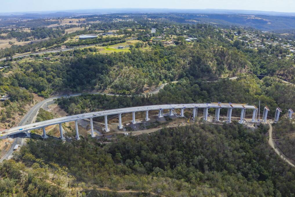 Crossing: The TSRC project includes an 800m long viaduct being built east of the New England Highway.