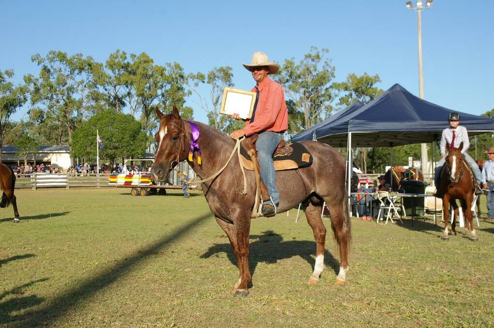 Might and majesty: Yeppoon's Corey Smith on Oak n Cat at The Caves Show in 2016. The pair combined to win the Champion Working Stock Horse event.