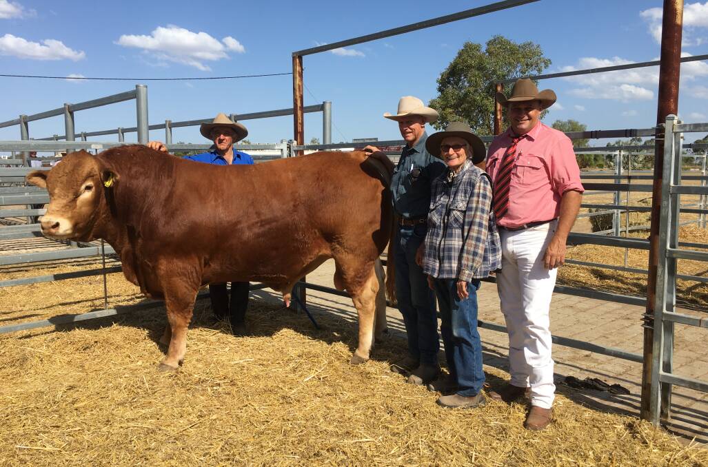 Gary Graham, Talana Limousins, with buyers Lawrence and Pat Hack, Rocklea, Alpha with agent Randall Spann, Elders.