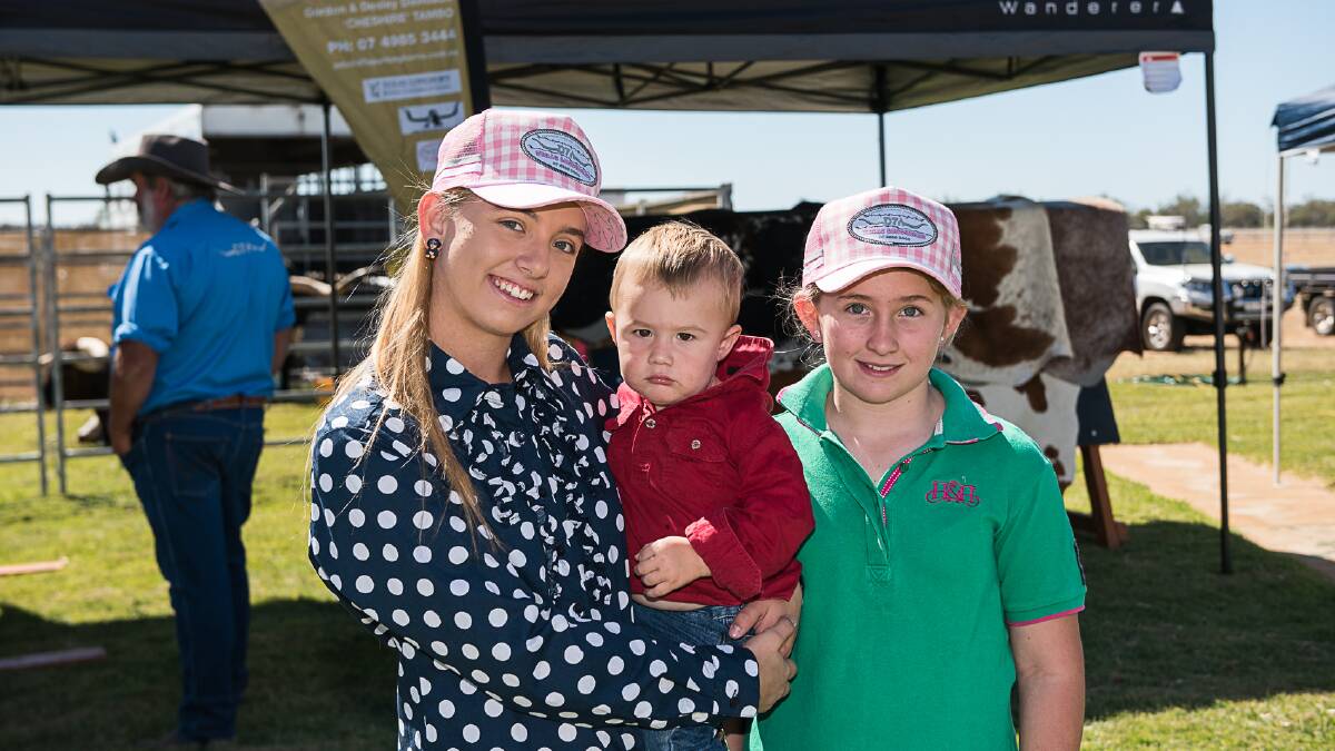 Heidi and Holly Russell, Tambo take Cooper Moran, Toowoomba for a walk around the show.