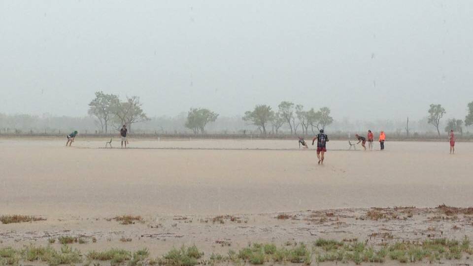 The photograph of the rained-out cricket match at Blackall that went viral on social media. Picture: Cassie Turner.