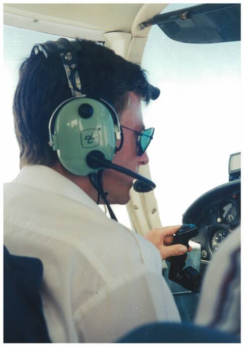 Brant Aldhamland at the controls of his plane.
