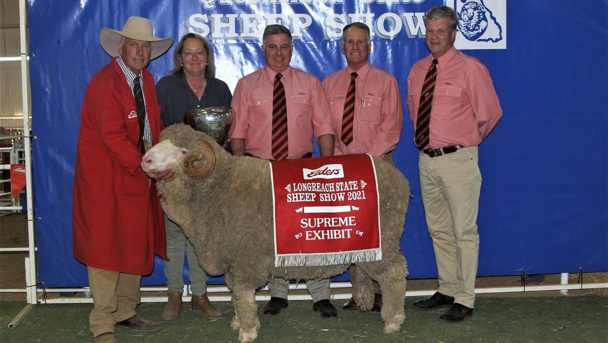 Nigel and Rosemary Brumpton, Mt Ascot Merino stud, Mitchell, holding the supreme exhibit of the 2021 State Sheep Show, along with Elders representatives Bruce McLeish, Duncan Ferguson, and Peter Sealy.