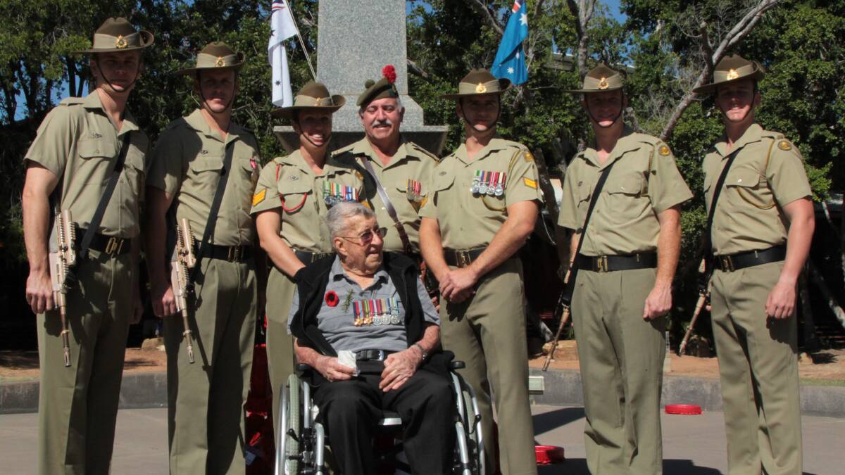 Representatives from Charlie Company, 31/42 Royal Queensland Regiment posed for a photograph at Blackall's cenotaph with Blackall's last serving World War II soldier, Kevin Heaps. Now 92, Mr Heaps saw action in New Guinea and was part of a battalion on Bougainville that captured a Japanese mountain gun, which now sits in Blackall's Memorial Park.