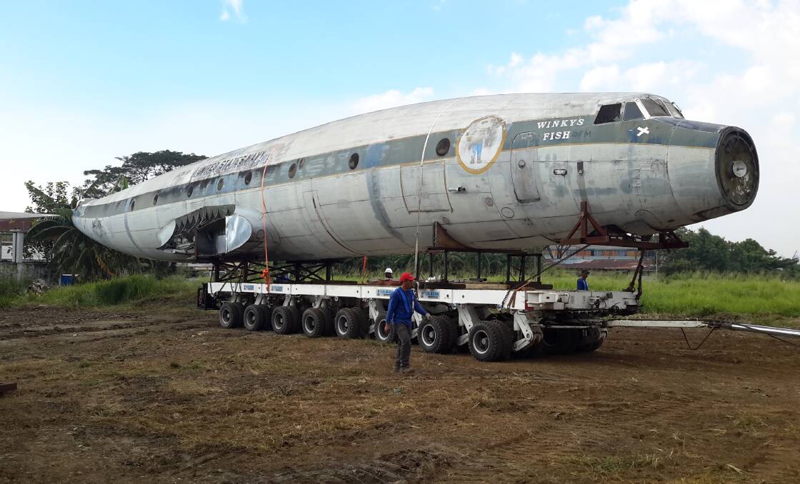 Salvaged: The fuselage of the recovered Super Constellation being moved to storage in the Philippines. Picture: Qantas Founders Musuem.