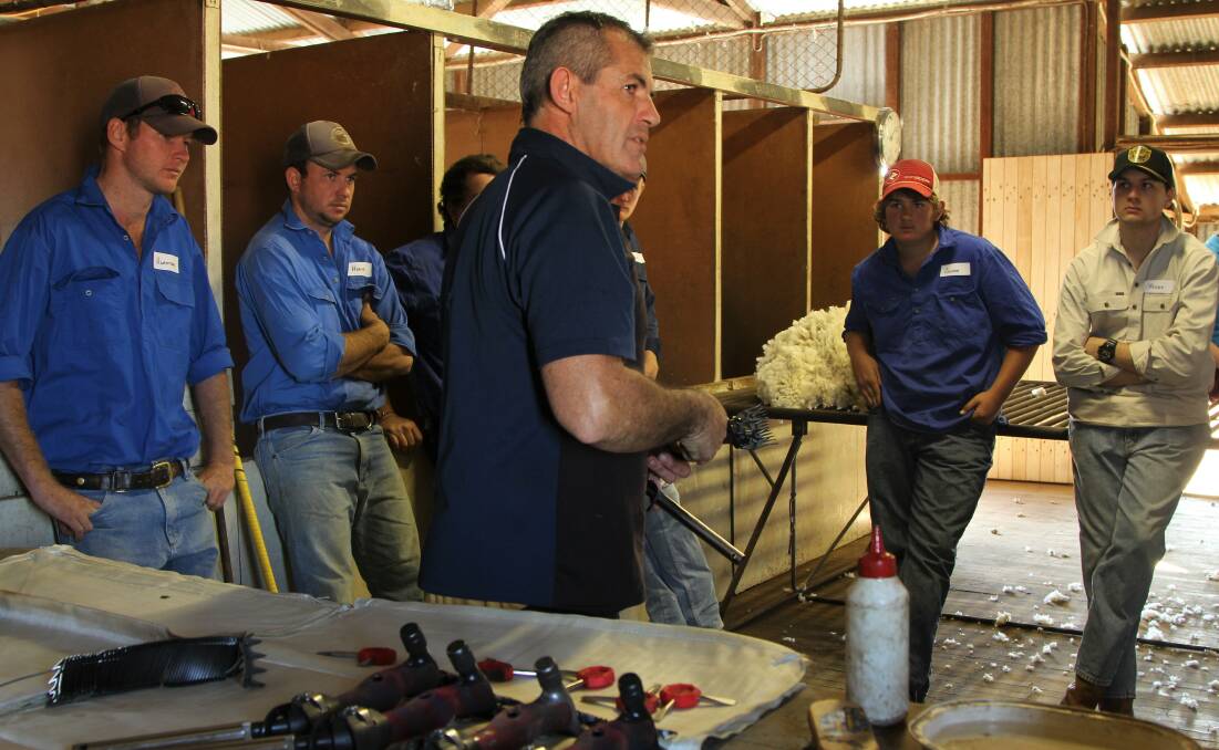 Dwayne Black teaching gear maintenance techniques at the shearing school.