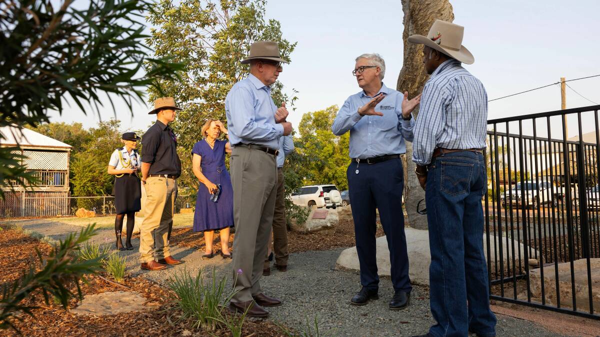 Longreach Regional Council CEO Brett Walsh, centre, explains aspects of the centenary garden to Governor-General David Hurley. Pictures supplied.