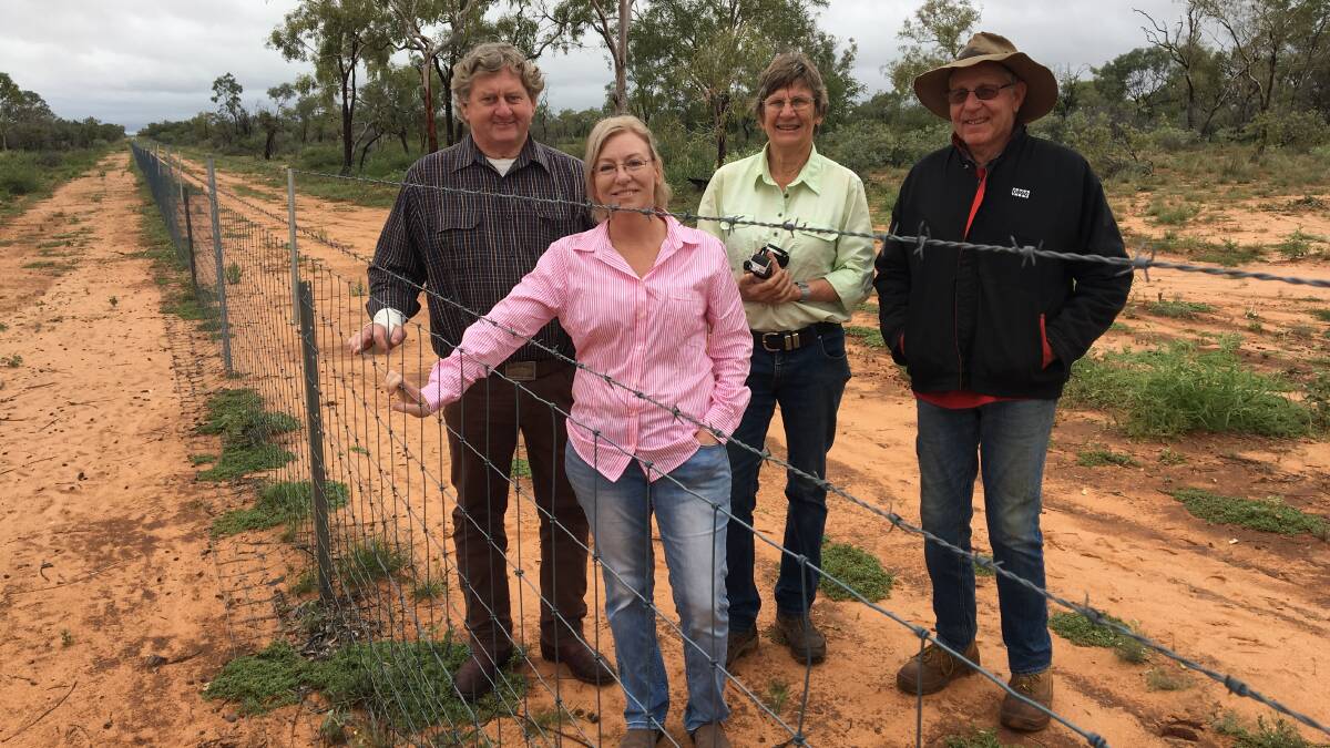 Agriculture Minister Leanne Donaldson pictured with Wild Dog Fence commissioner Vaughan Johnson and Longreach landholders Elisabeth and Peter Clark, inspecting their exclusion fence.