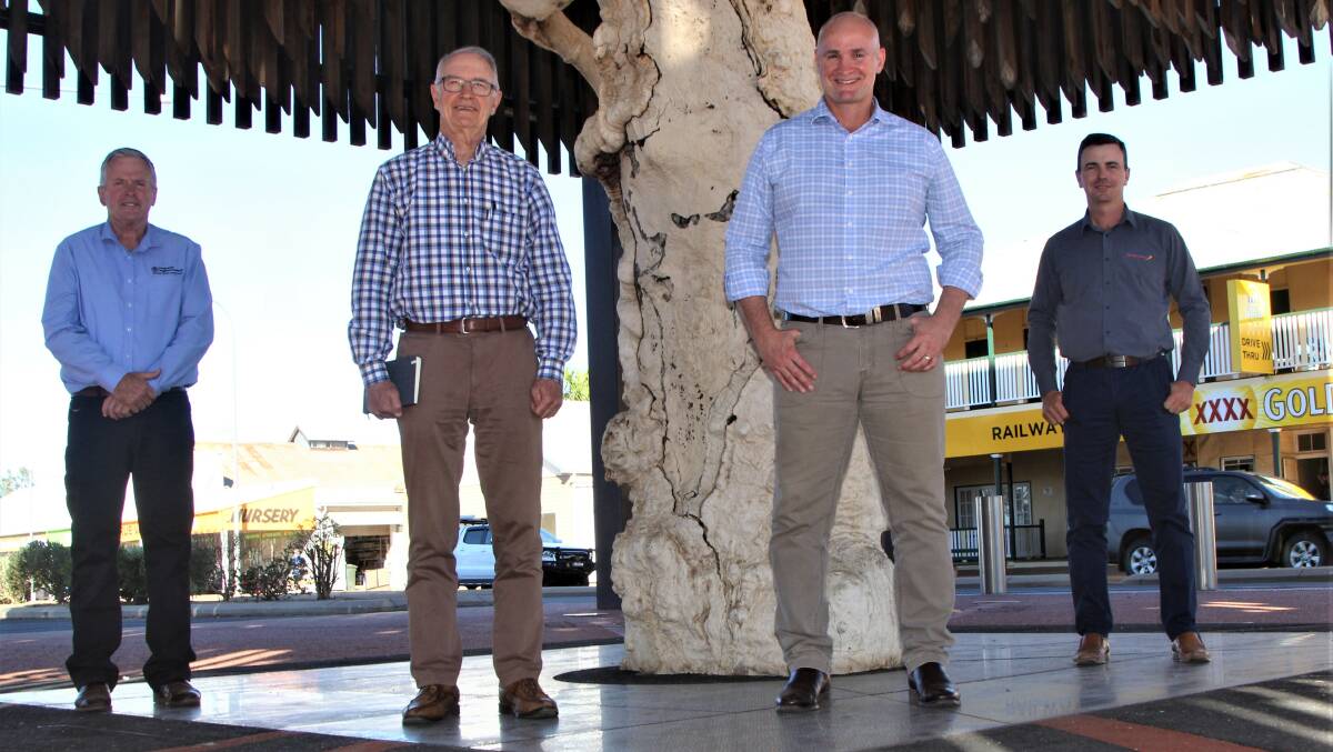 Remote Area Planning and Development Board chairman Tony Rayner, Professor Ross Garnaut, Regional Development and Manufacturing Minister Glenn Butcher, and Barcaldine mayor Sean Dillon at Barcaldine's historic Tree of Knowledge, which provided a symbolic backdrop for the feasibility study announcement. Picture - Sally Gall.