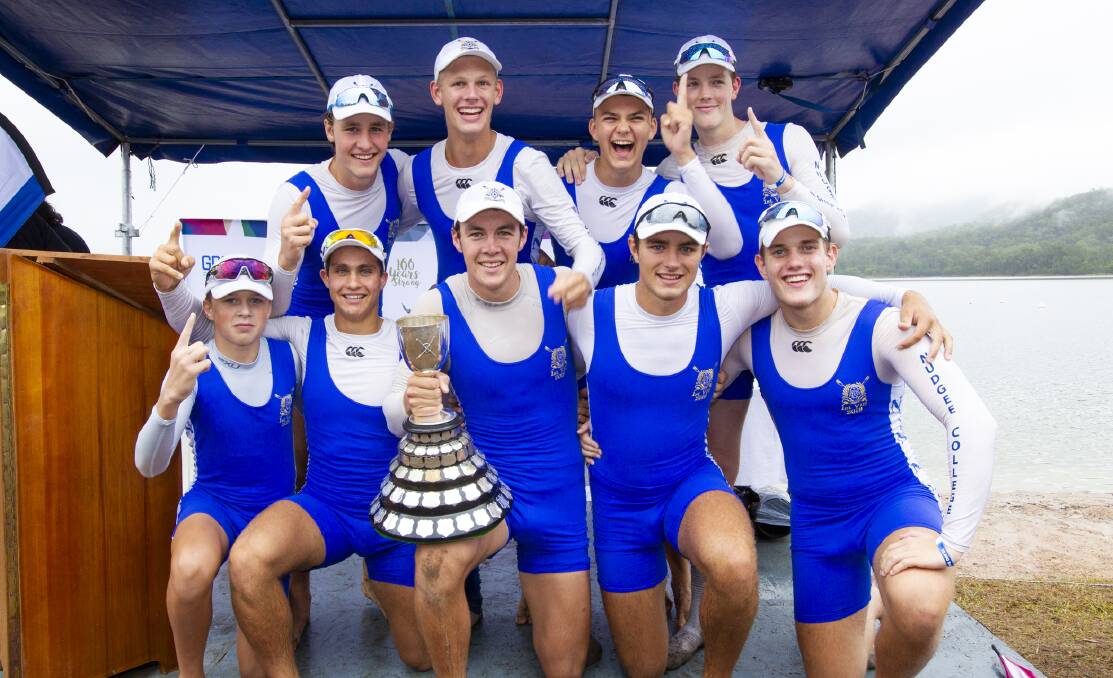 Nudgee's first VIII celebrating their Head of the River win at Wyaralong Dam on the weekend. Picture - Gary Lynagh.