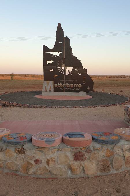 A front-on view of the monument. The discs made by school children in the seating area are in the foreground.