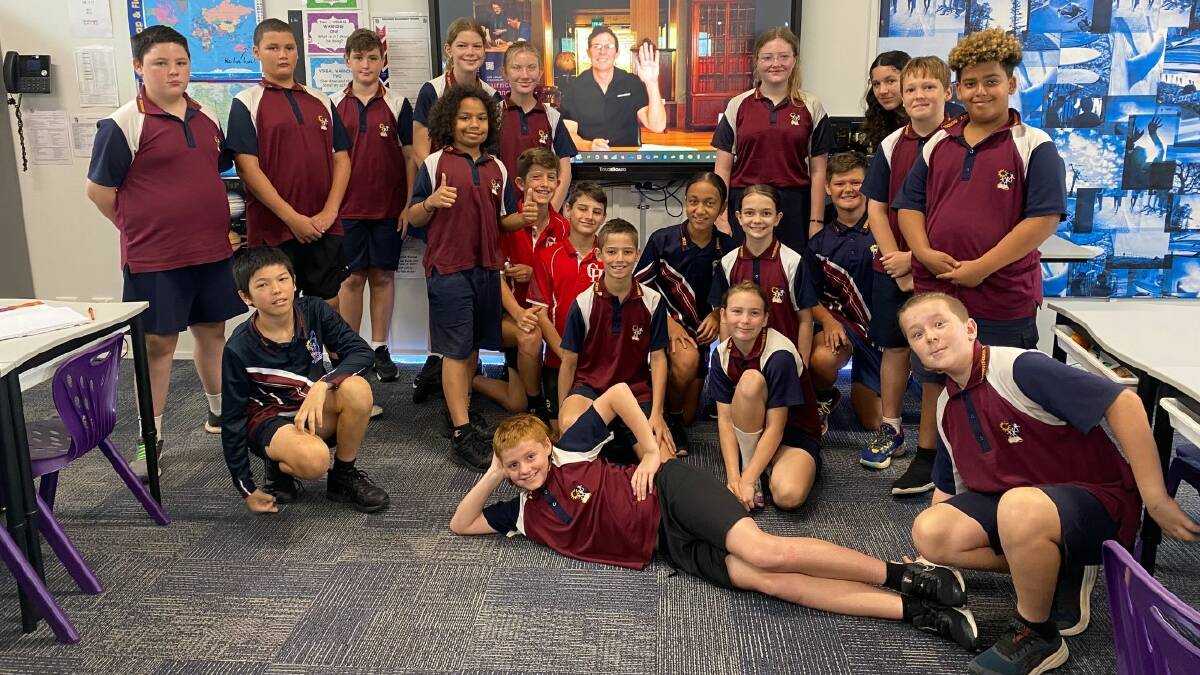 Moranbah State School students with Live at the Library presenter Troy Bullock on screen. Picture: Supplied