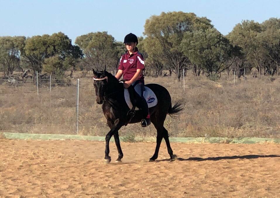 Sophie Kent practising her daily routine at home at Longreach. Photos supplied.