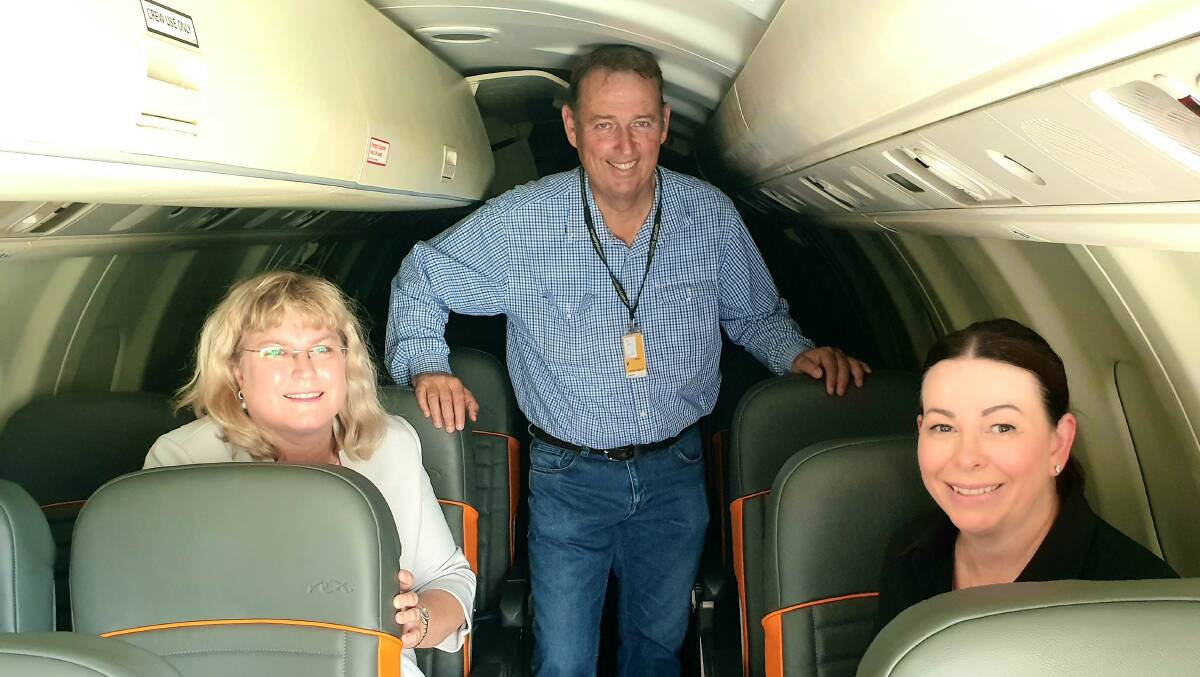 Warrego MP Ann Leahy and Maranoa Regional Council mayor Tyson Golder check out the interior of the Rex Airlines 33-seat Saab plane that will be used on the Roma-Charleville-Brisbane route.